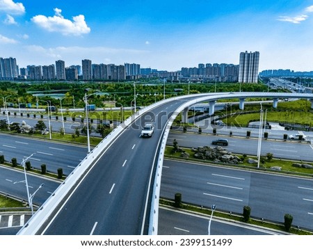 Modern city overpass, urban traffic overlook Royalty-Free Stock Photo #2399151499