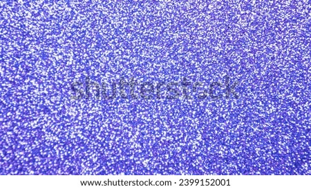 Blurred blaze blue glitter Christmas texture backdrop. 
Red purple abstract photo of bokeh lights.