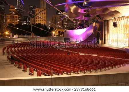 Jay Pritzker Pavilion Amphitheater and Cityscape Night View, Chicago Illinois Royalty-Free Stock Photo #2399168661