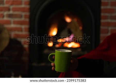 Enjoying Hot Coffee in front of the Fireplace During New Year's Eve, Kadikoy Istanbul, Turkiye (Turkey)