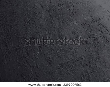 Black stone background, textured and ceramic blackboard.