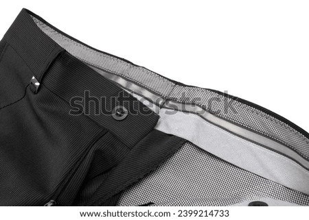 Closeup of Pair of New Straight Black Silk Mens Trousers on Pure White Background From Above View. Horizontal image Composition