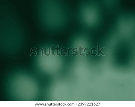 Green blurred lights for a magical or spooky abstract background.