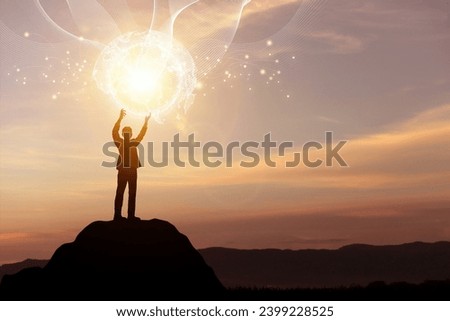 Silhouette man on top mountain with virtual world. Concept of global network connection, Online Media Asset design, big data exchange, connection creativity, innovation, and inspiration.