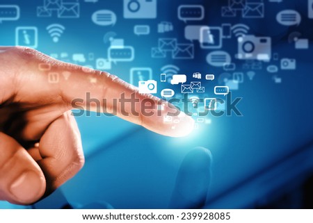 Close up of human hand touching screen of tablet