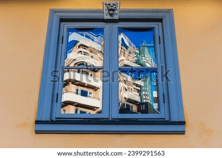 Daytime reflection of Gothenburg building exterior with picture frame window