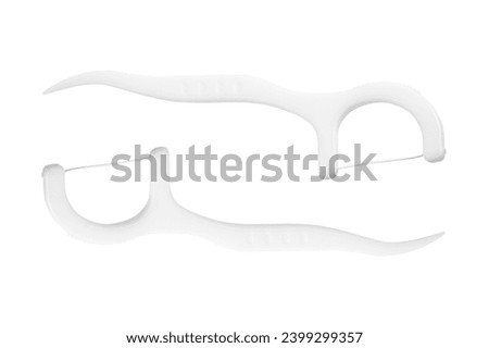 Floss toothpick isolated on white. Dental hygiene concept. Set of dental floss, toothpick. Plastic white dental toothpick with floss. Dental floss Royalty-Free Stock Photo #2399299357