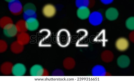 The bulbs are decorated with numbers 2024 and the lights are blurred, abstract light bokeh background.                               