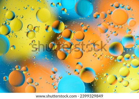 blue and orange spots with multi-colored circles similar to the galaxy and microcosm 15