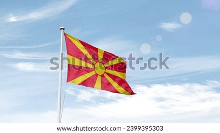 North Macedonia national flag waving in the sky.