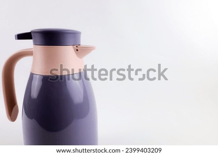 Thermos flask, plastic thermos isolated on white background.