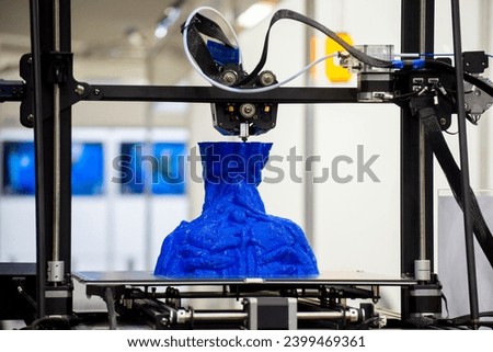 3D printer printing object close-up. Process creating three-dimensional model on 3d printer. Additive printer technology. 3D Prototyping. 3D design modeling. New modern innovation printing technology Royalty-Free Stock Photo #2399469361