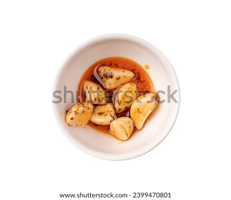Pickled Garlic Isolated, Fermented Garlic Cloves with Red Chili Pepper, Hot Pickle Vegetable, Spices Garlic Cloves in Oil and Vinegar on White Background
