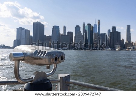 Viewfinder along the East River in Brooklyn Heights with a View of the Lower Manhattan Skyline in New York City