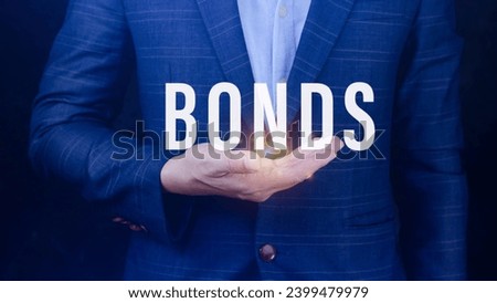 Businessman holding bonds virtual screen. Bond Finance Banking Technology concept, Trade Market Network, bond security that indicates the investor has provided loan the issuer, Equivalent loan Royalty-Free Stock Photo #2399479979