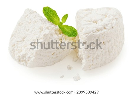 Cottage cheese isolated on white background closeup. Fresh grainy cottage cheese or feta with mint leaf close up Royalty-Free Stock Photo #2399509429