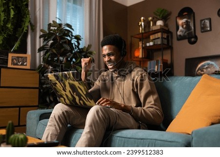First job experience delighted african american dark skinned man guy employee having successful job interview conference with employer for new job smiling hired applicant making good first expression. Royalty-Free Stock Photo #2399512383