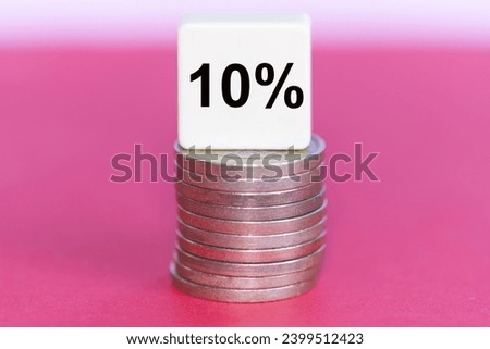 The concept of the word 10 percent on ten coins. Business concept.