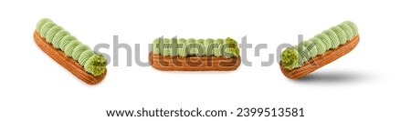 Delicious Pistachio Eclair on White Isolated Background, Eclair with Pistachio Cream and Filling Royalty-Free Stock Photo #2399513581
