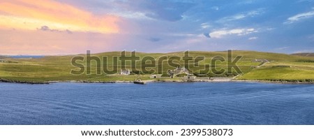 Scotland Shetland scenery in England with cliffs, ocean views and green pastures.