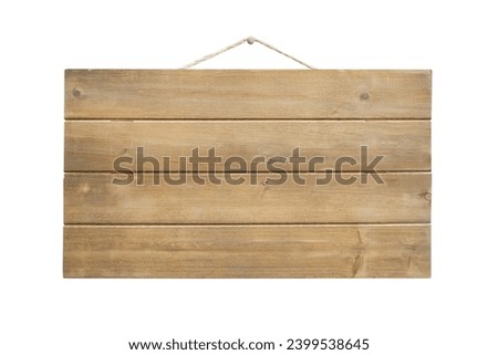 Blank wooden sign hanging from a nail with white background and copy space
