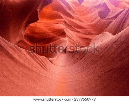 Look of water shaped smooth sandstone walls to unusual curves and adges in antelope national park in arizona, america, usa Royalty-Free Stock Photo #2399550979