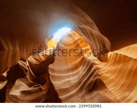 Look of water shaped smooth sandstone walls to unusual curves and adges in antelope national park in arizona, america, usa Royalty-Free Stock Photo #2399550981