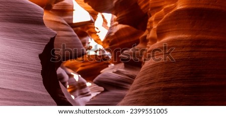 Look of water shaped smooth sandstone walls to unusual curves and adges in antelope national park in arizona, america, usa Royalty-Free Stock Photo #2399551005