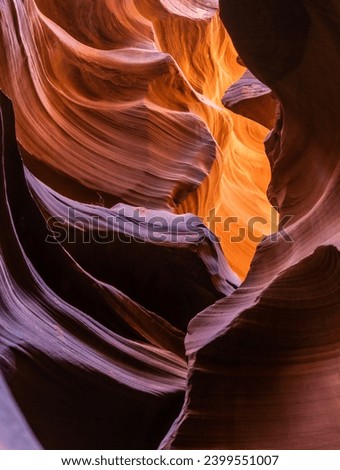 Look of water shaped smooth sandstone walls to unusual curves and adges in antelope national park in arizona, america, usa Royalty-Free Stock Photo #2399551007