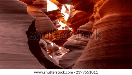 Look of water shaped smooth sandstone walls to unusual curves and adges in antelope national park in arizona, america, usa Royalty-Free Stock Photo #2399551011