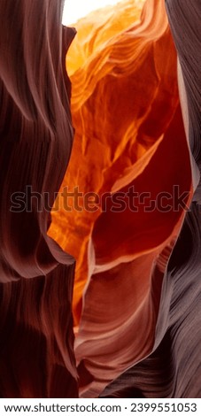 Look of water shaped smooth sandstone walls to unusual curves and adges in antelope national park in arizona, america, usa Royalty-Free Stock Photo #2399551053