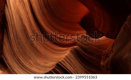 Look of water shaped smooth sandstone walls to unusual curves and adges in antelope national park in arizona, america, usa Royalty-Free Stock Photo #2399551063
