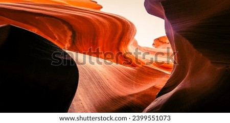 Look of water shaped smooth sandstone walls to unusual curves and adges in antelope national park in arizona, america, usa Royalty-Free Stock Photo #2399551073