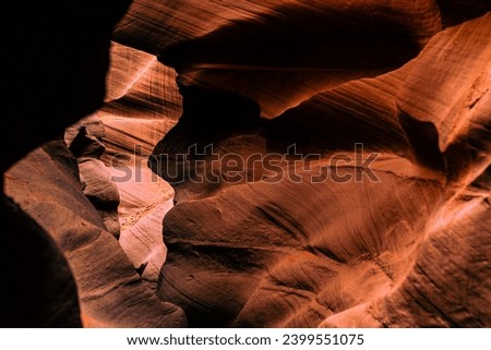 Look of water shaped smooth sandstone walls to unusual curves and adges in antelope national park in arizona, america, usa Royalty-Free Stock Photo #2399551075