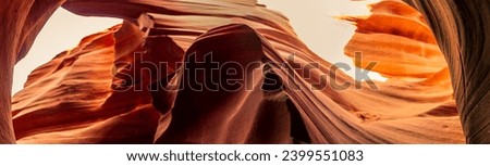 Look of water shaped smooth sandstone walls to unusual curves and adges in antelope national park in arizona, america, usa Royalty-Free Stock Photo #2399551083