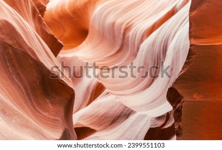 Look of water shaped smooth sandstone walls to unusual curves and adges in antelope national park in arizona, america, usa Royalty-Free Stock Photo #2399551103