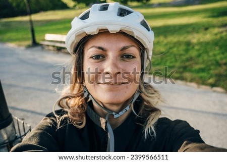 CENTRAL PARK, NEW YORK, USA - AUG 2th , 2022: bicycle helmet girl in central Park. High quality photo