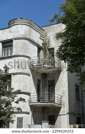 stepped facade of a historical building with corner balconies