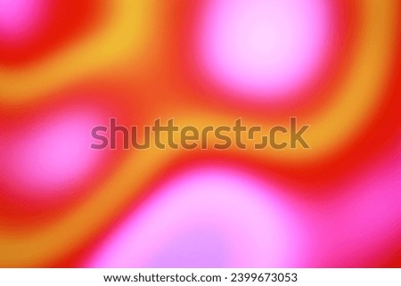 Blurry image of fluorescent gradation color pattern on red background