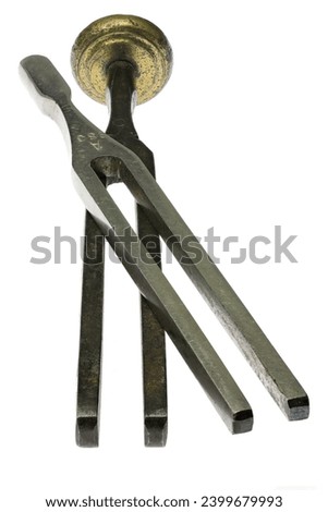 vintage tuning forks isolated on white background
