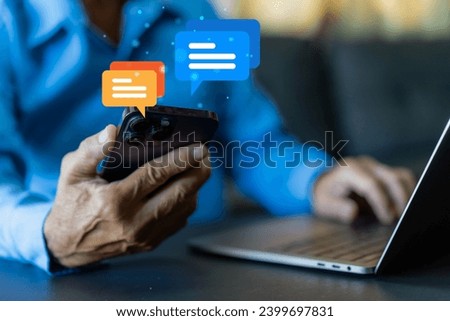 Human hand using smartphone typing Live chat chatting and social network concepts, chatting conversation working at home in chat box icons pop up. Social media marketing technology concept	