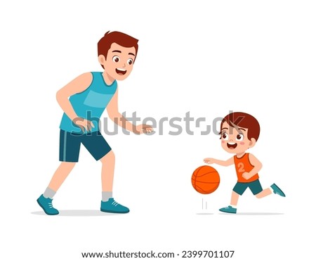little kid with father play basketball Royalty-Free Stock Photo #2399701107