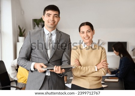Business colleagues working in office