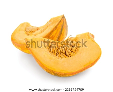 Pieces of fresh pumpkin on white background