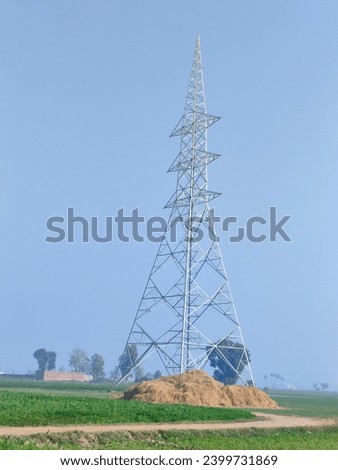 Electrical Tower In Field. Electricity Tower .Huge Size Electric Tower