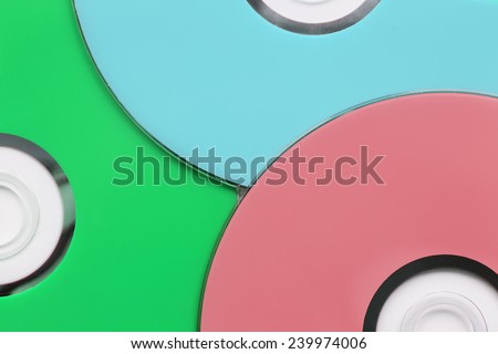 Blank colorful compact discs closeup as a background