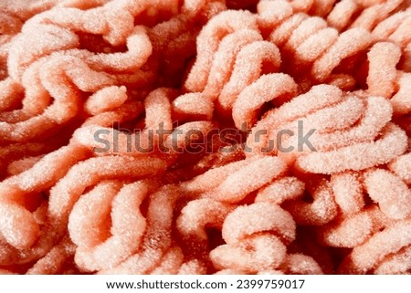 Close-up on the texture of frozen minced meat