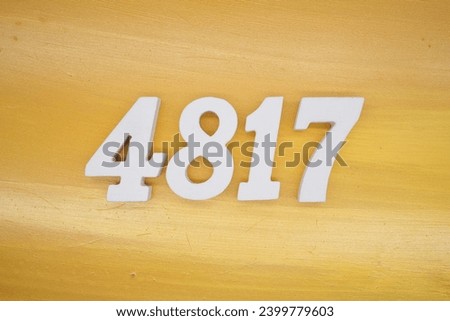 The golden yellow painted wood panel for the background, number 4817, is made from white painted wood.
