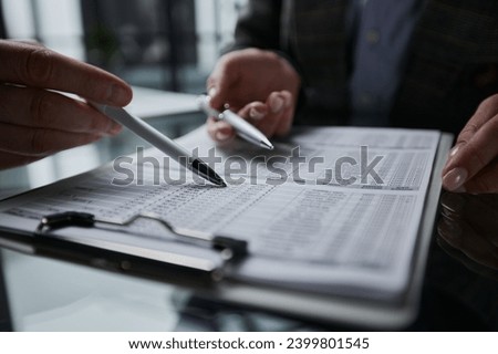 completing a business company personal information checklist form.