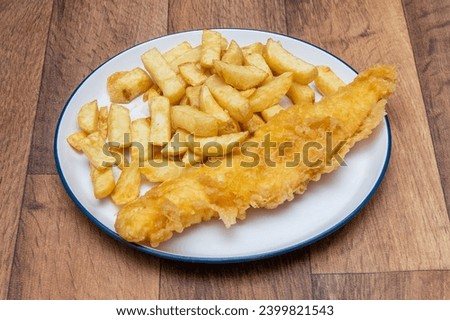 Chip Shop Food, deep fried food, battered food, fish and chips, black pudding, white pudding, burgers and chips, pies, chips, fish chips and peas Royalty-Free Stock Photo #2399821543